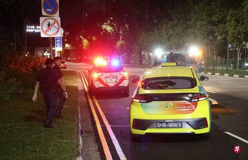 SG police arrive after rock was thrown at taxi