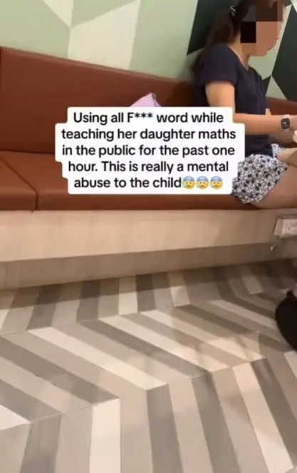 SG woman teaching her daughter math