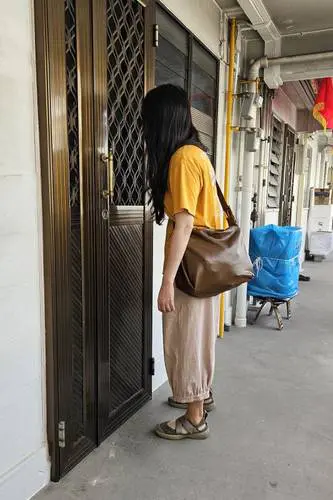 Shin Min Daily News reporter visits troubling neighbour