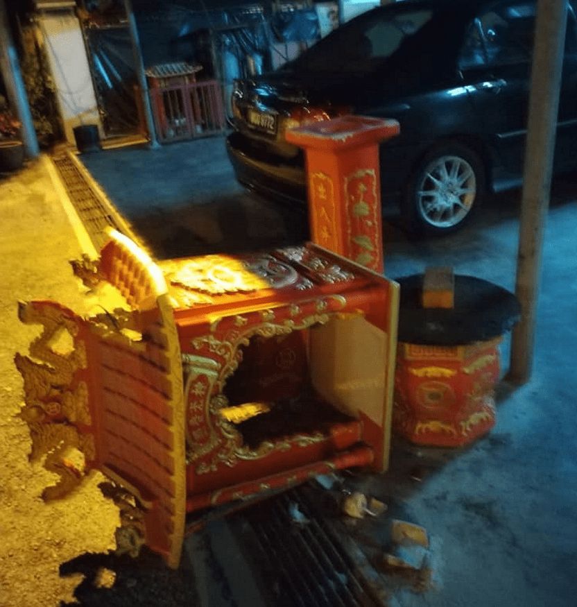 toppled Chinese shrine