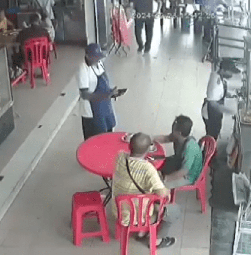 staff talking to two customers