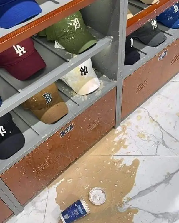 Branded caps stained by spilt coffee
