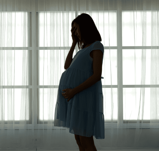 stressed pregnant woman