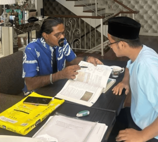 Subash Abdullah teaching his student