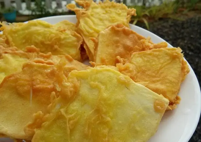 A plate full of jackfruit fritters. 