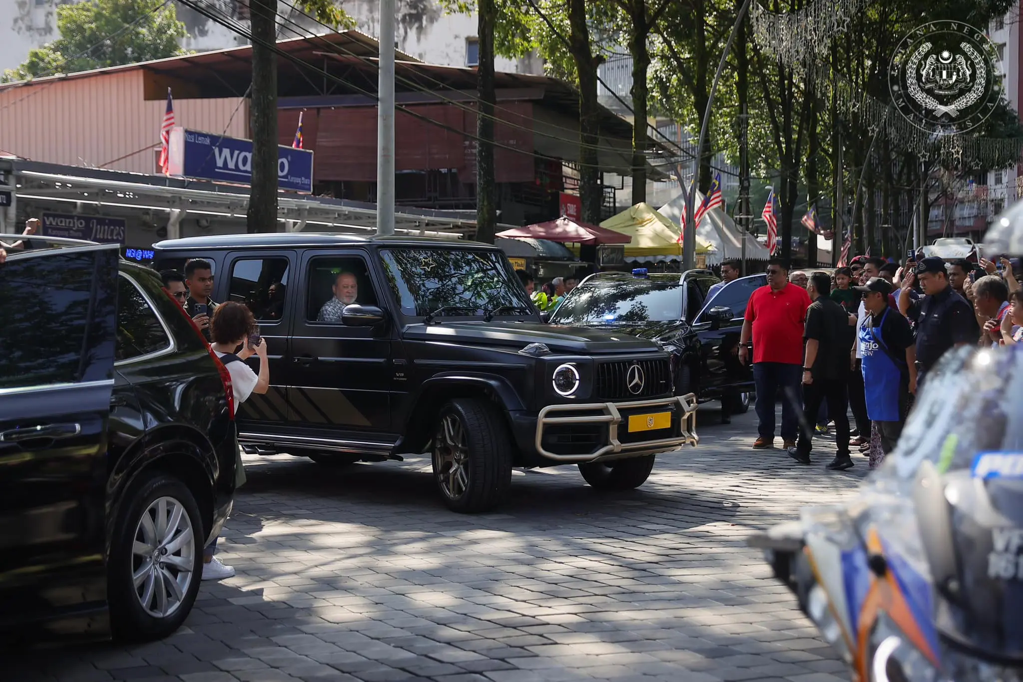 Sultan Ibrahim driving his black Mercedes G-Class