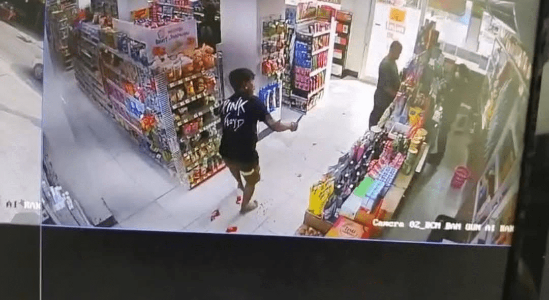 Thai man waving knife inside convenience store