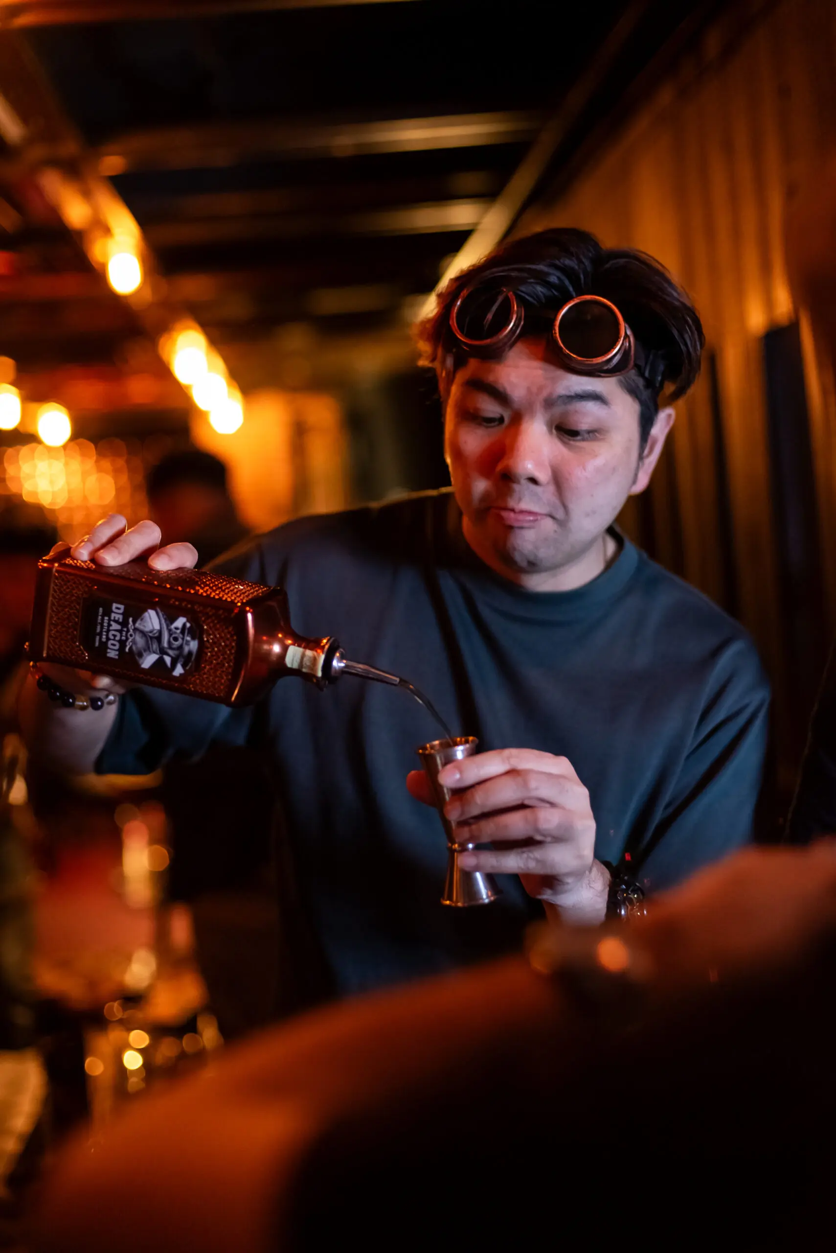 The Deacon launch at Skullduggery making cocktail