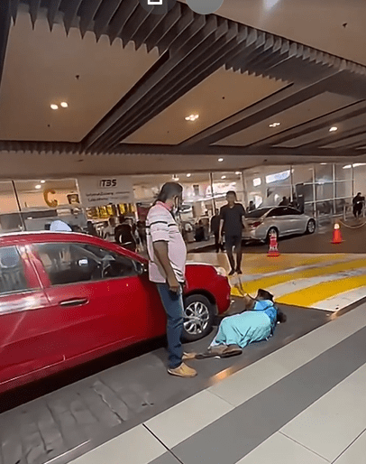 The driver confronting the woman