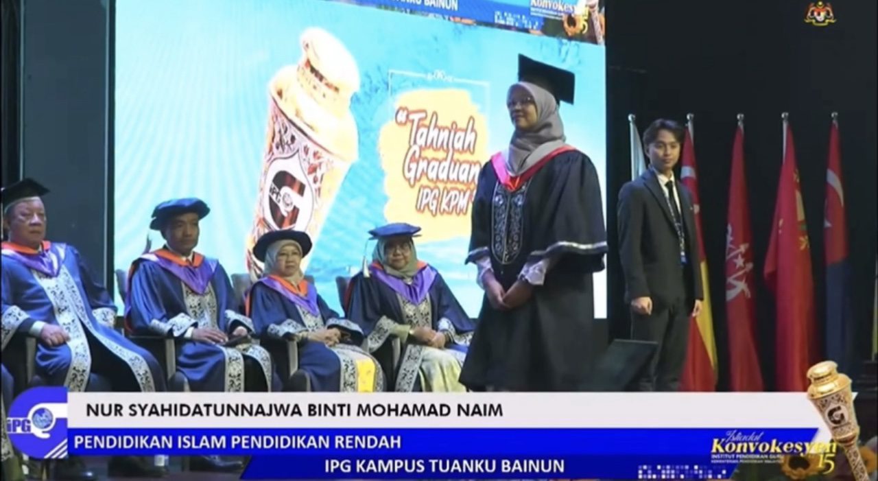 The graduate waiting to receive her stroll