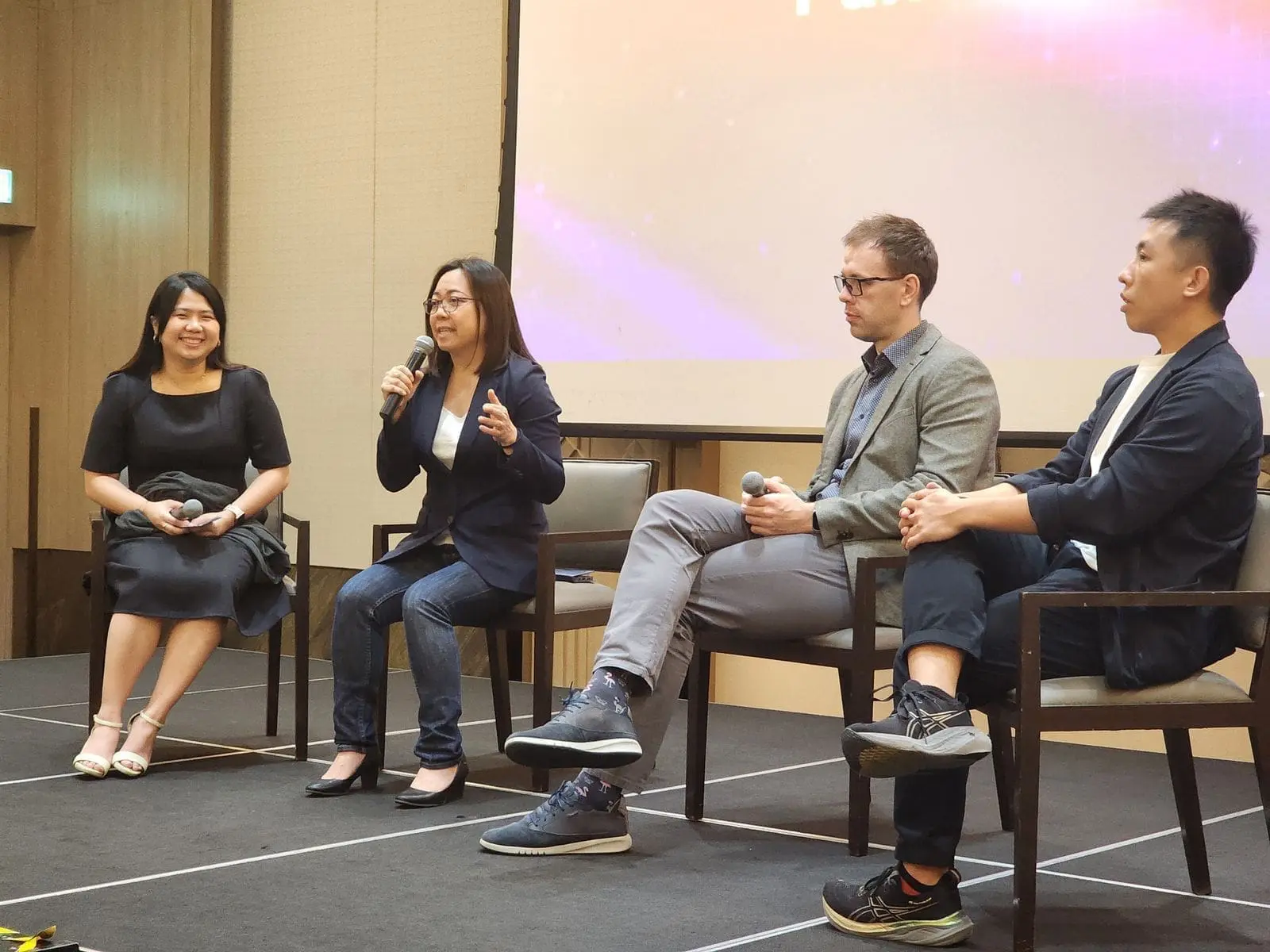 Three industry leaders discussing their insights on utilizing Martech tools in business activities