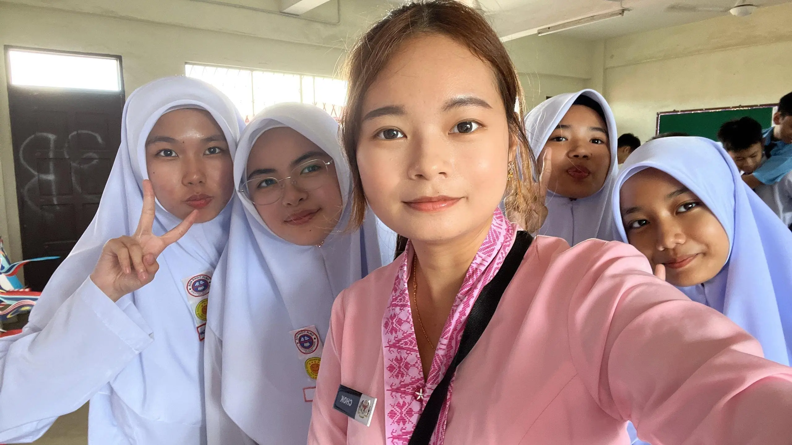 Taking photo with student