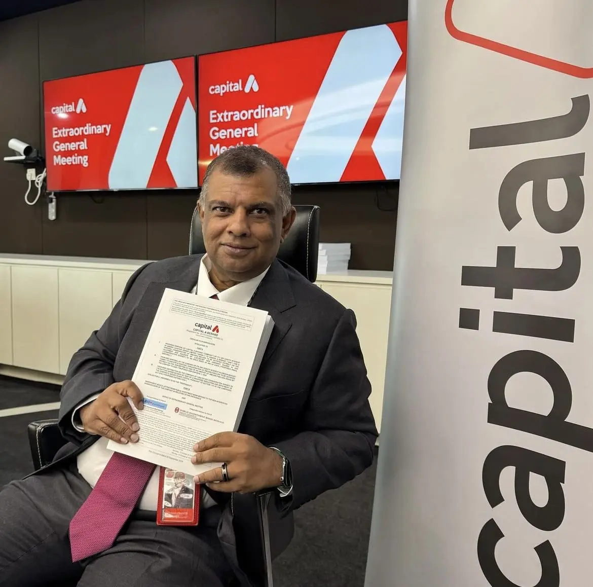 Tony Fernandes at a meeting