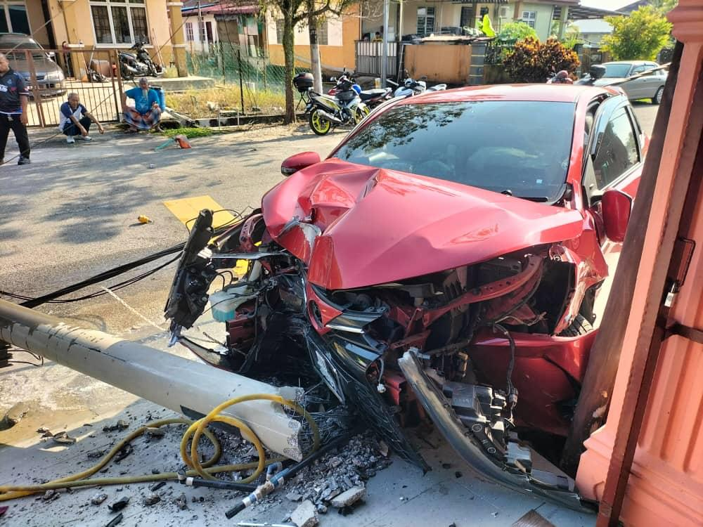 Toyota Yaris destroyed by electricity pole