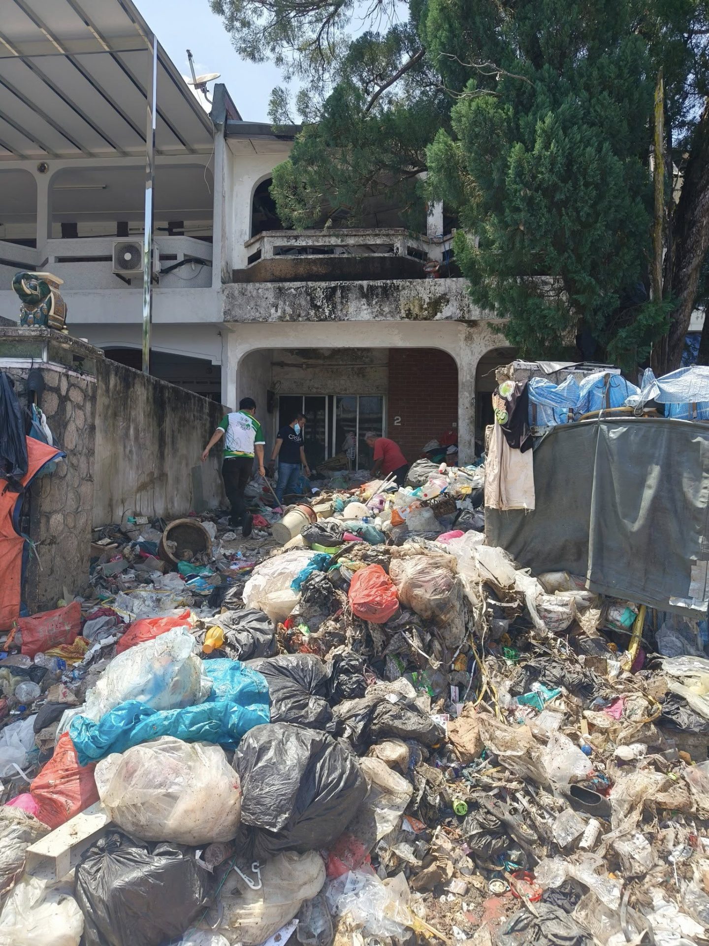 Trash filling up man's house in Johor