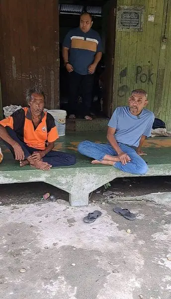 two man visiting izara's house