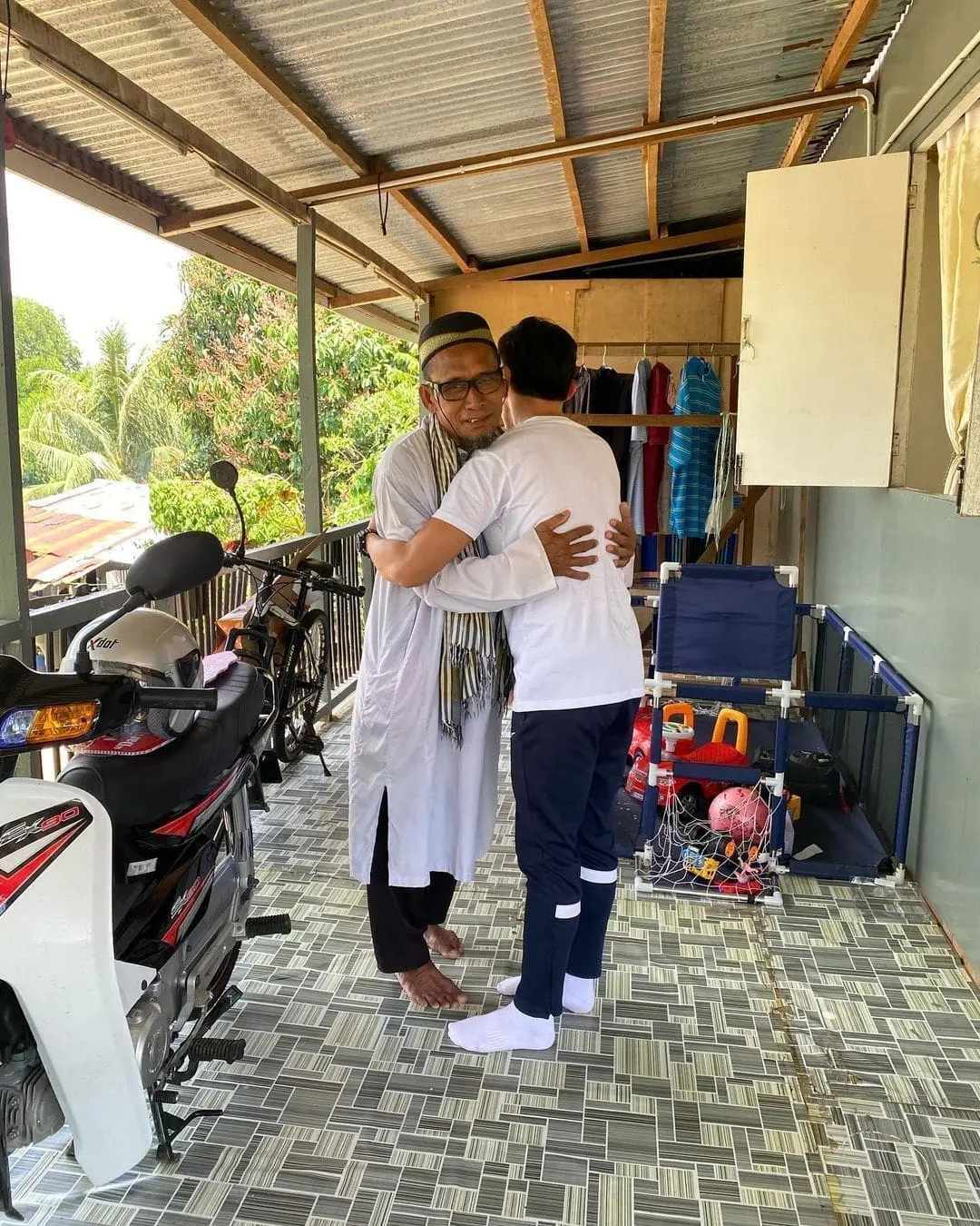 uncle basri hugging adrian