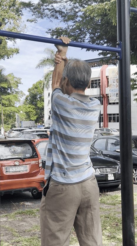 uncle doing pull ups