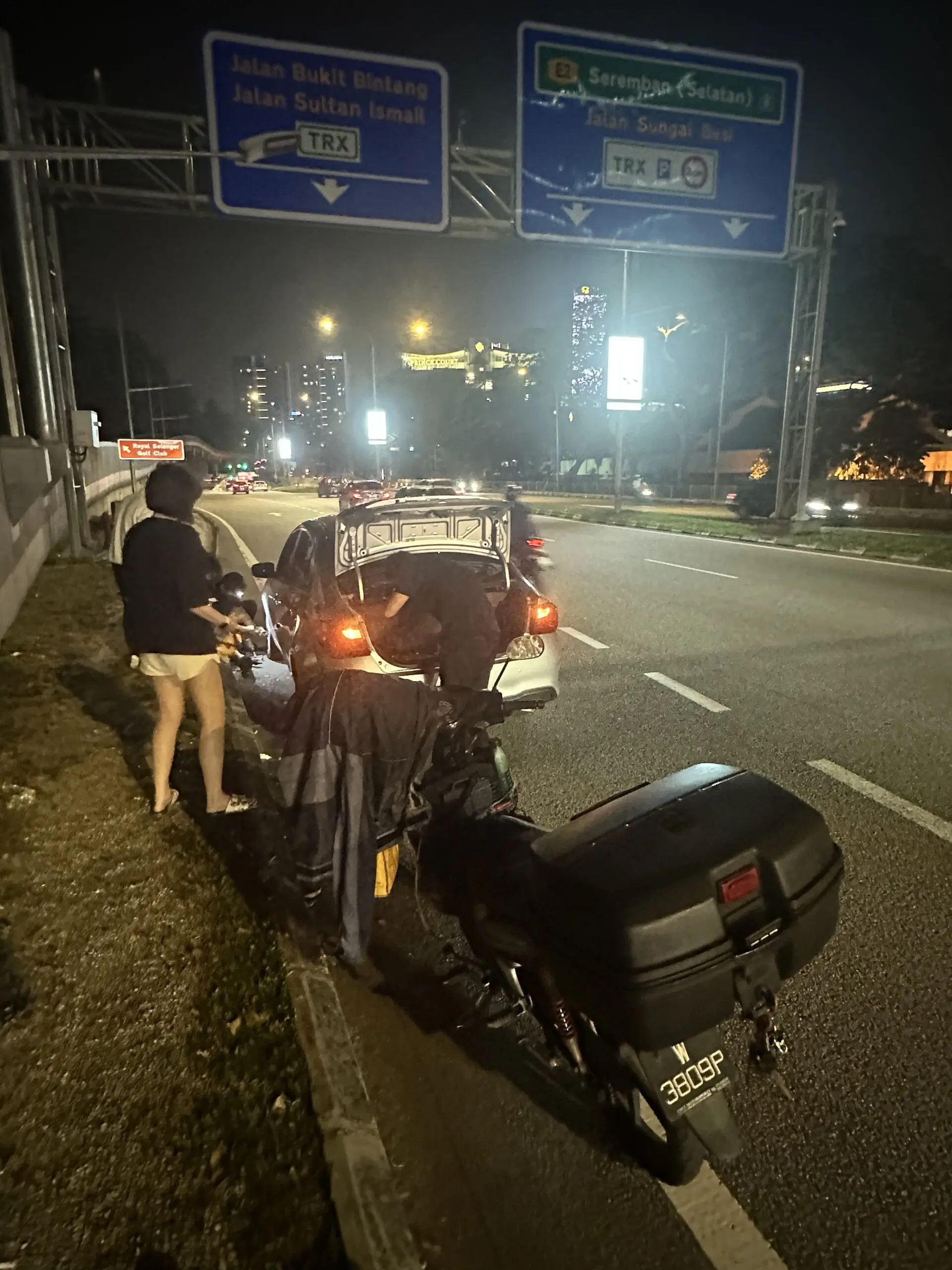 Uncle starting to help take out the tyre