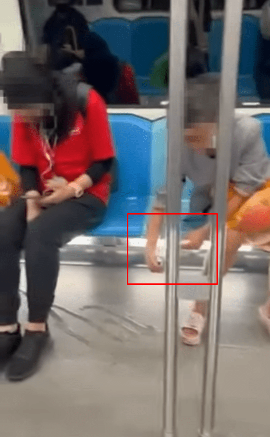 Woman washing her hands in a LRT tram
