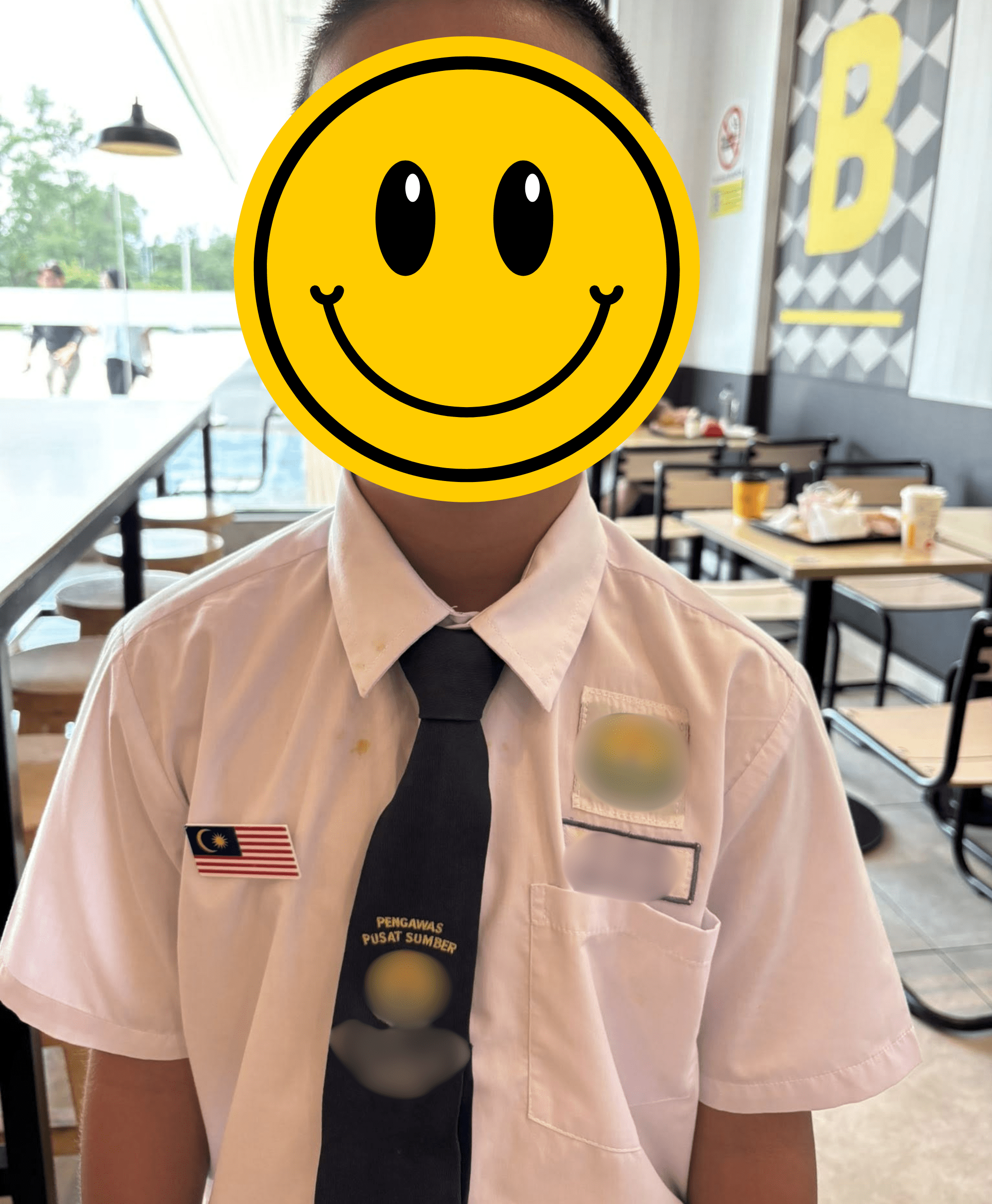 Wearing Jalur Germilang with pride