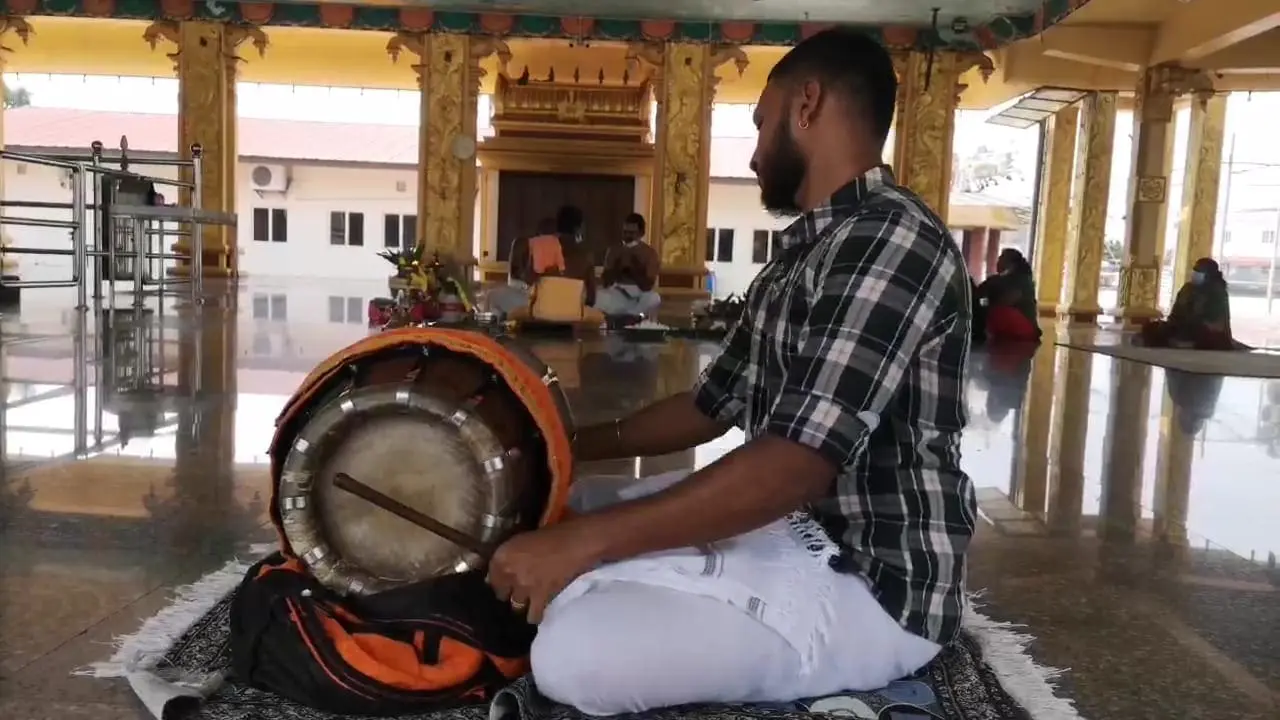 Wishnuendran Balan playing tabla at a wedding  