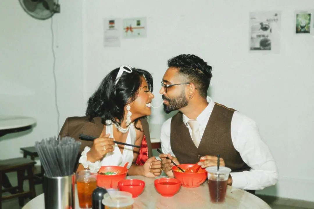 Priscilla and her husband sharing a string of Pan Mee