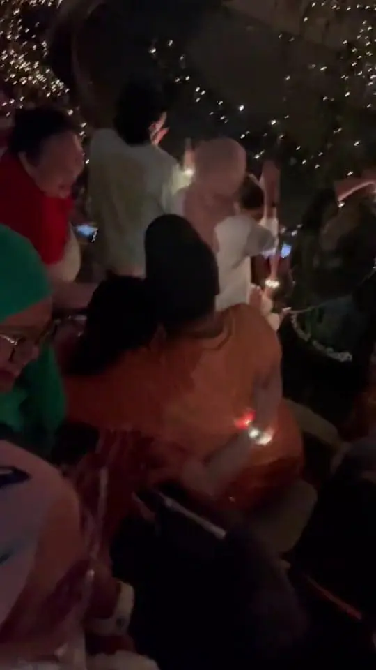 Msian couple watching Coldplay's concert after getting engaged 