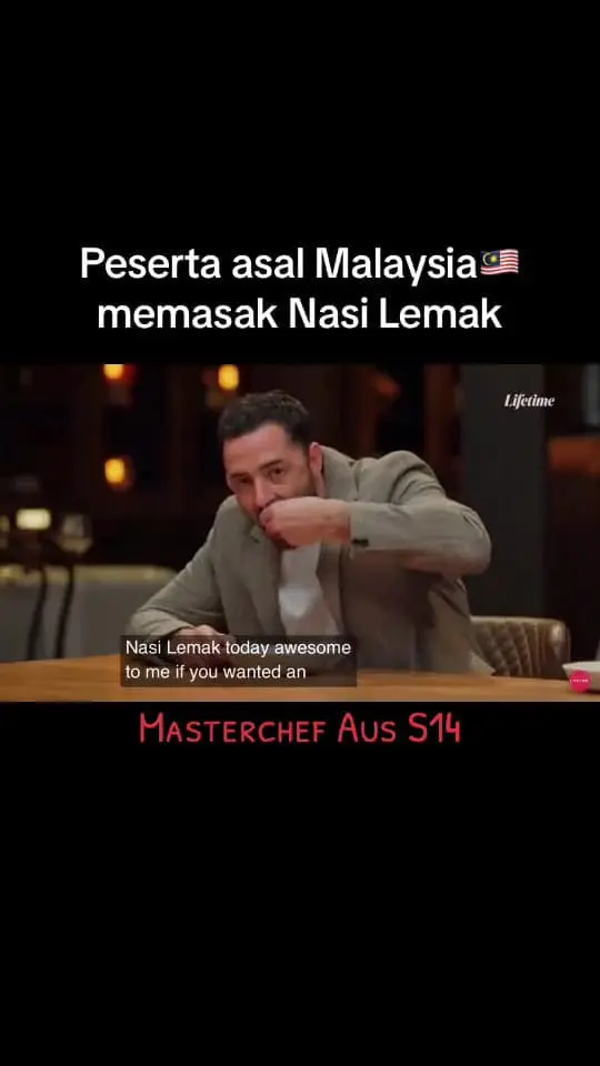 One of the Australia's Master Chef judges eating with his hand.