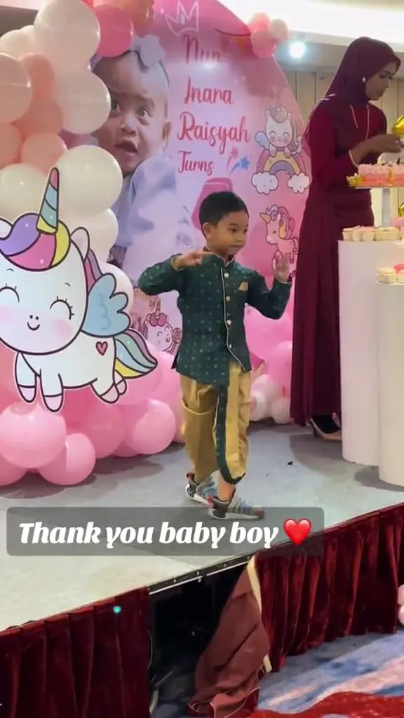 Muhammad Nurhaq dancing Indian classical dance at a birthday party. 