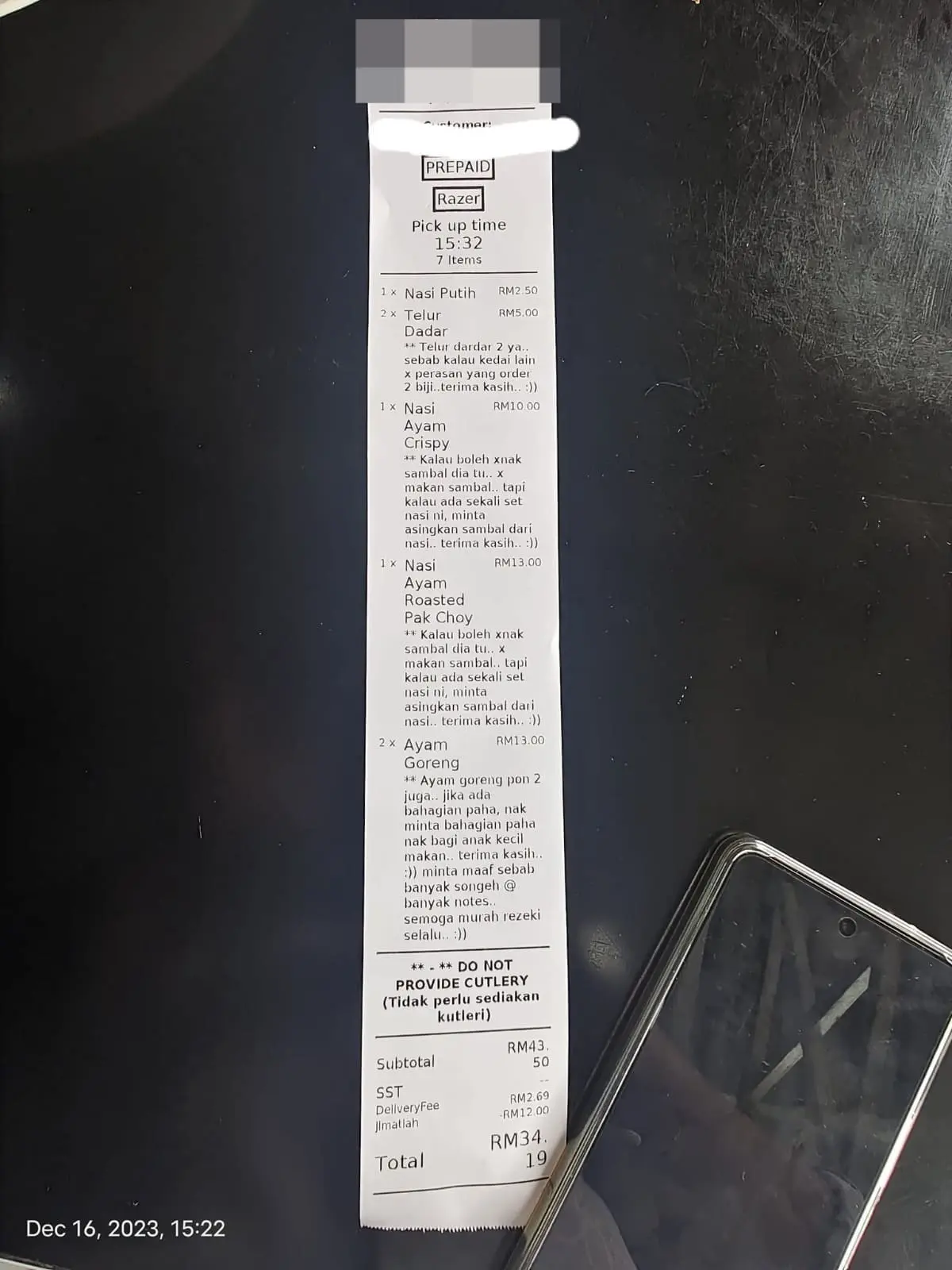 M'sian food vendor shares a receipt, meticulously detailed by a customer for every dish they ordered.