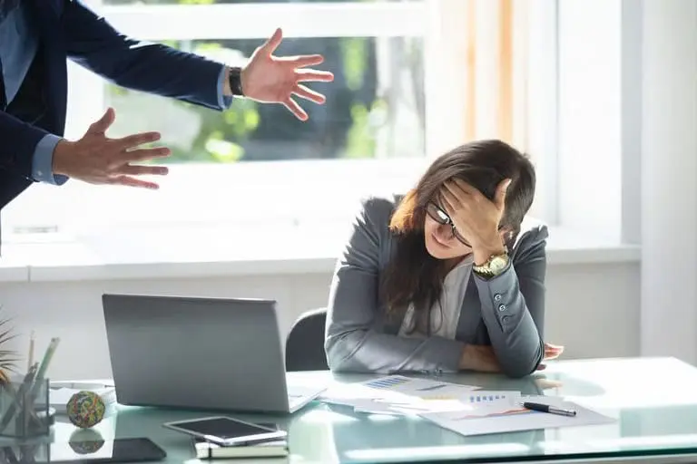 woman at workplace stressed