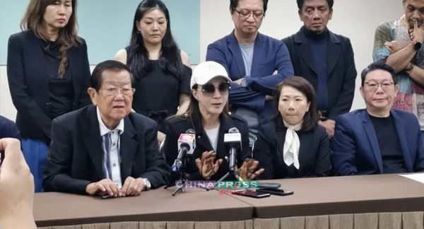 Winnie Kok speaking at press conference