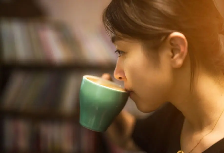 woman drinking coffee