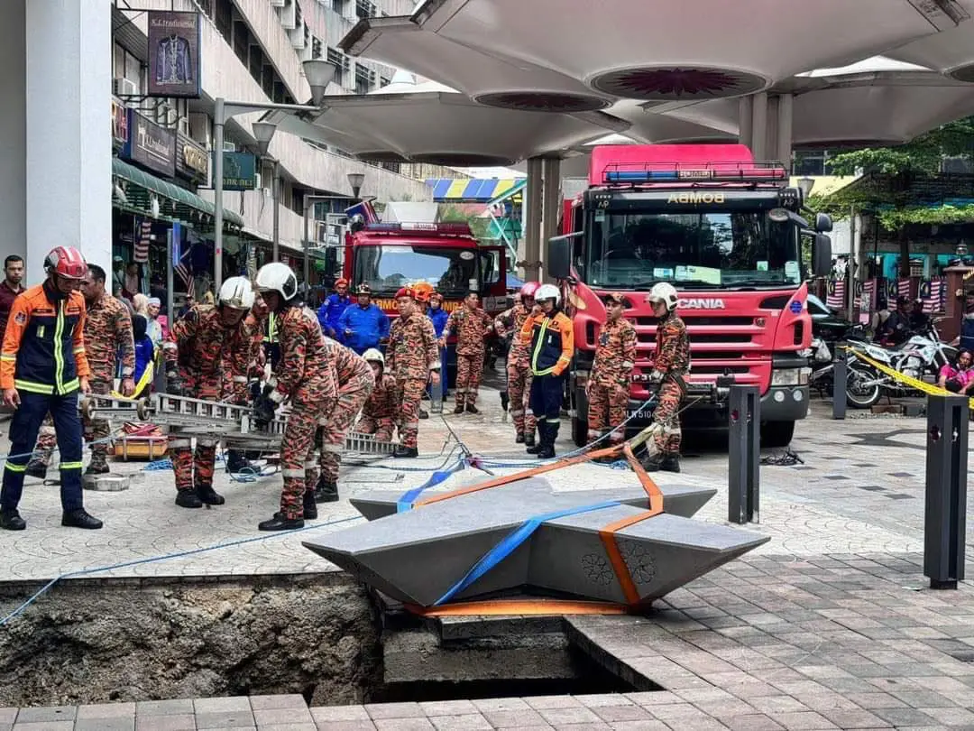 Woman falls into sinkhole in KL