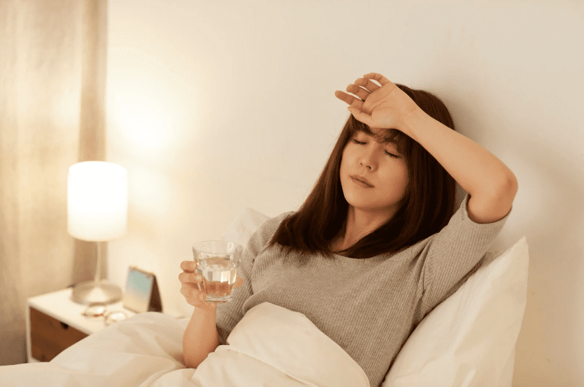 woman feeling sick