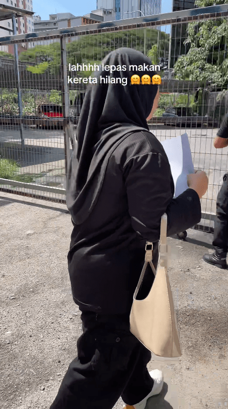 woman following the police to retrieve back her car at police station