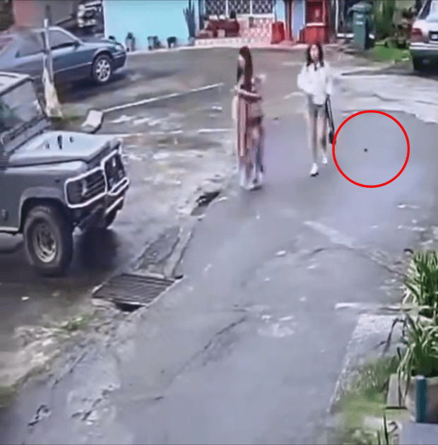 Foreign woman walks off after pooping