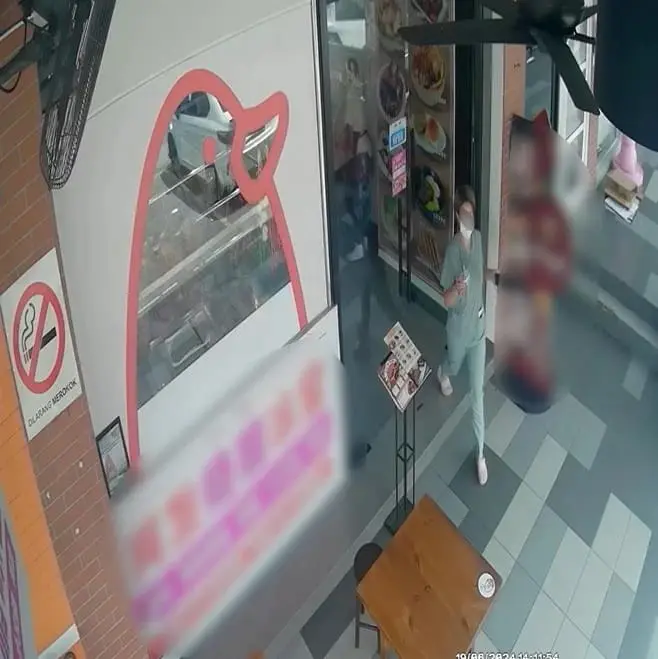 woman leaving a restaurant