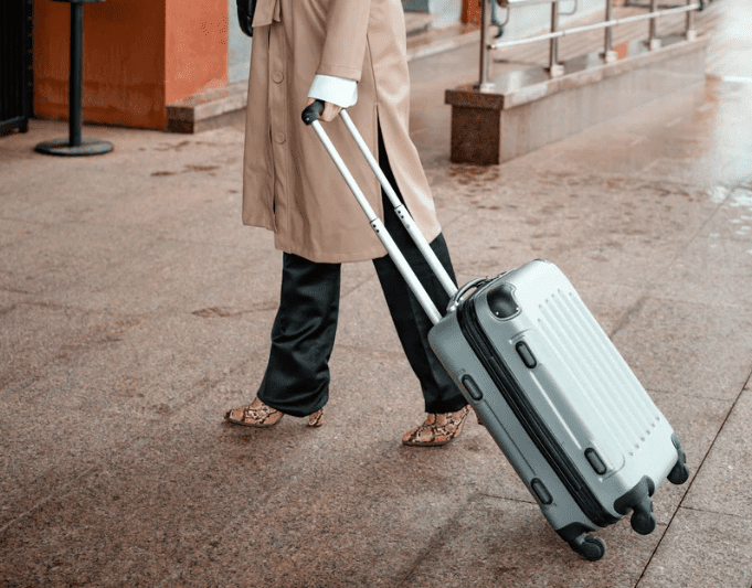 Woman pulling her luggage