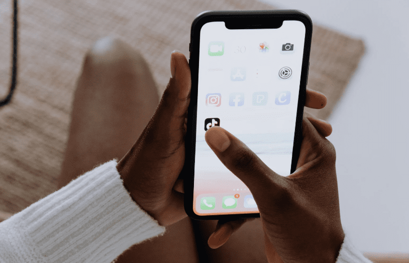 woman scrolling tiktok
