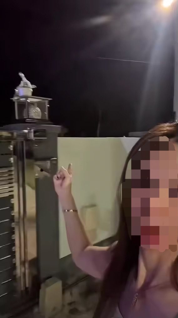 Woman shows where her order should be placed