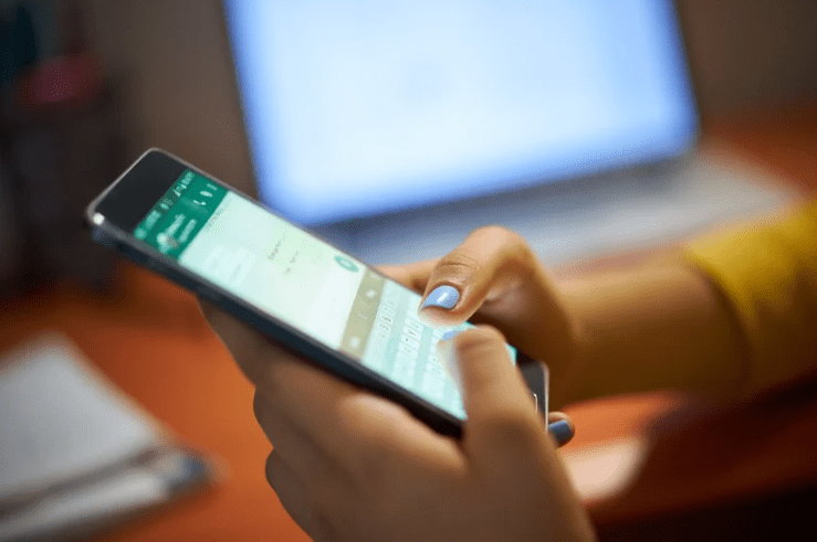 Woman using WhatsApp