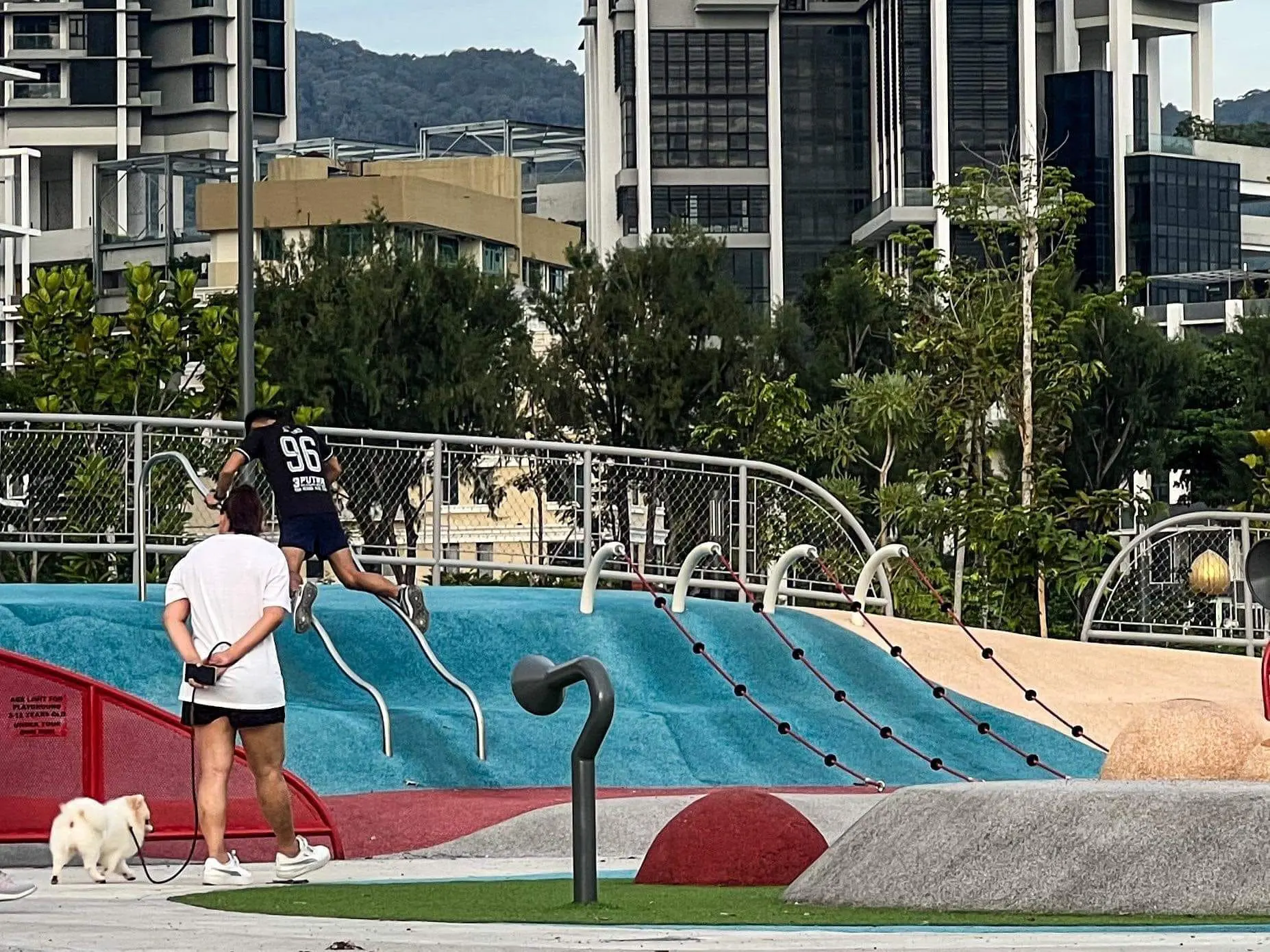 Woman with her dog at Gurney Bay