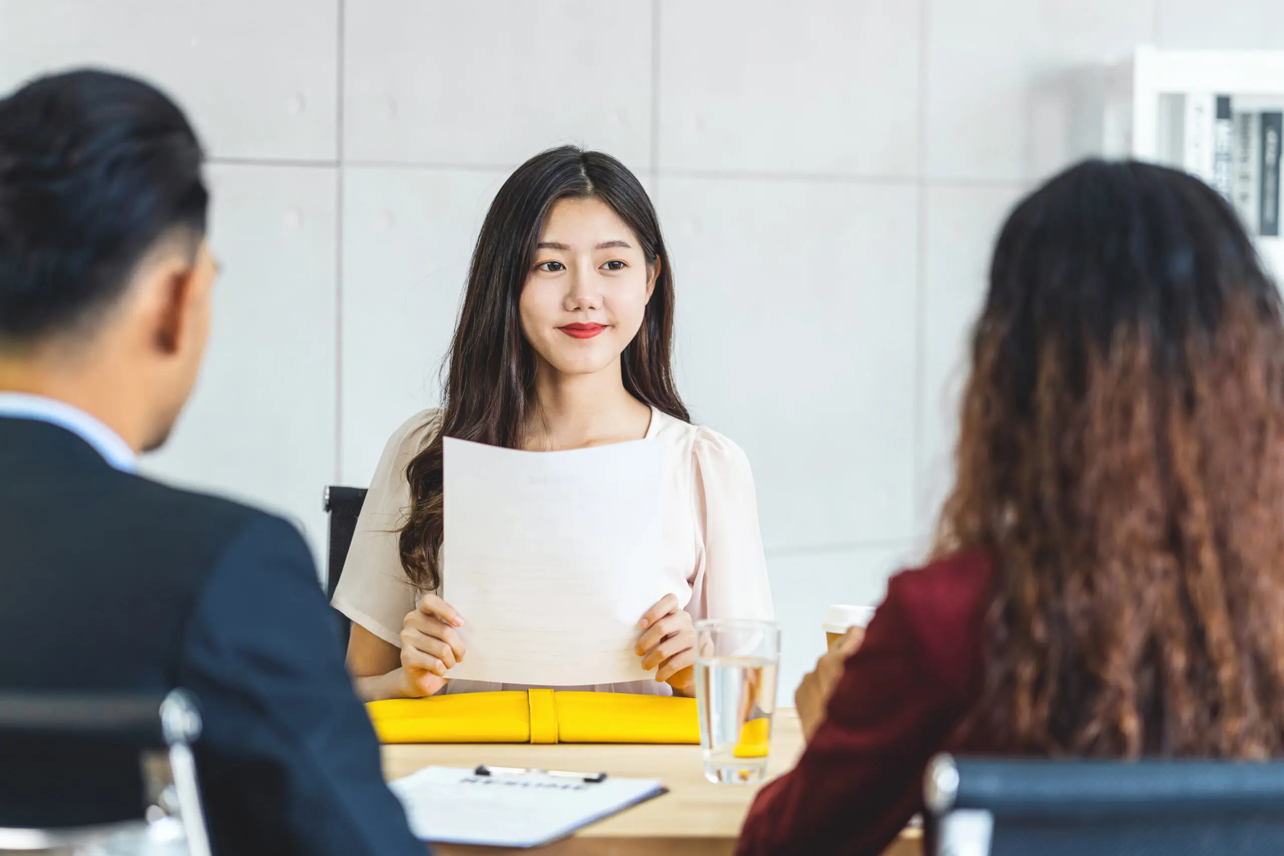 Young Asian woman sitting for a job interview