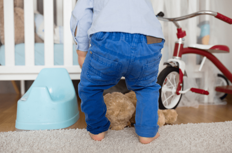 Young boy wets his pants