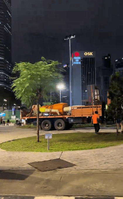 young hee doll tied up on a lorry at mrt ampang park