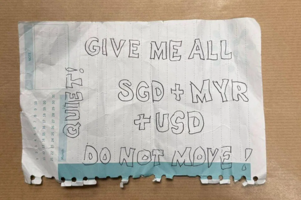 ‘Give Me All SGD, MYR & USD'- Man Tries To Rob S’pore Money Changer With Handwritten Note
