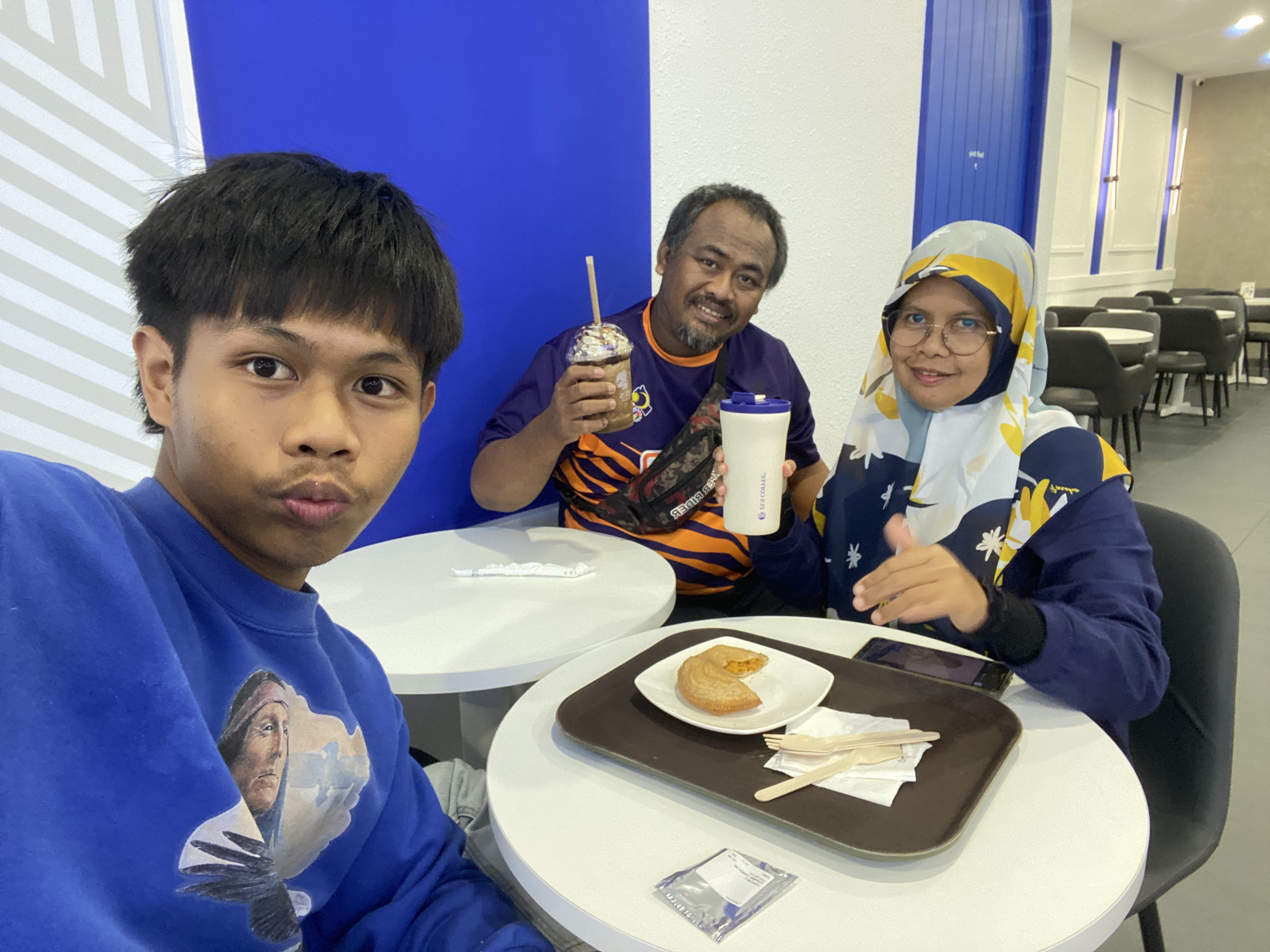 Nabil and Parents Enjoying Coffee at ZUS