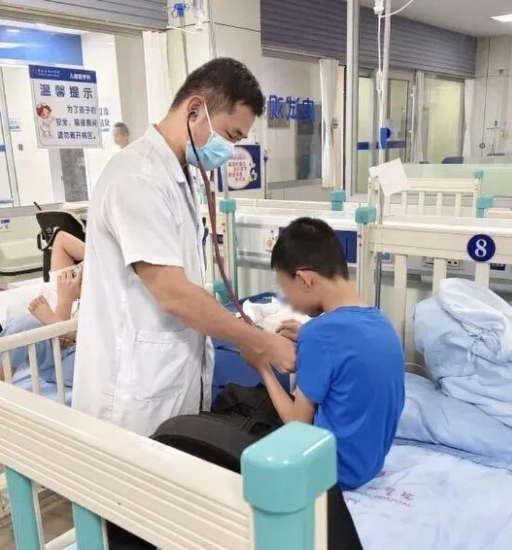 11 yo boy China homework 14 hours collapses hospital